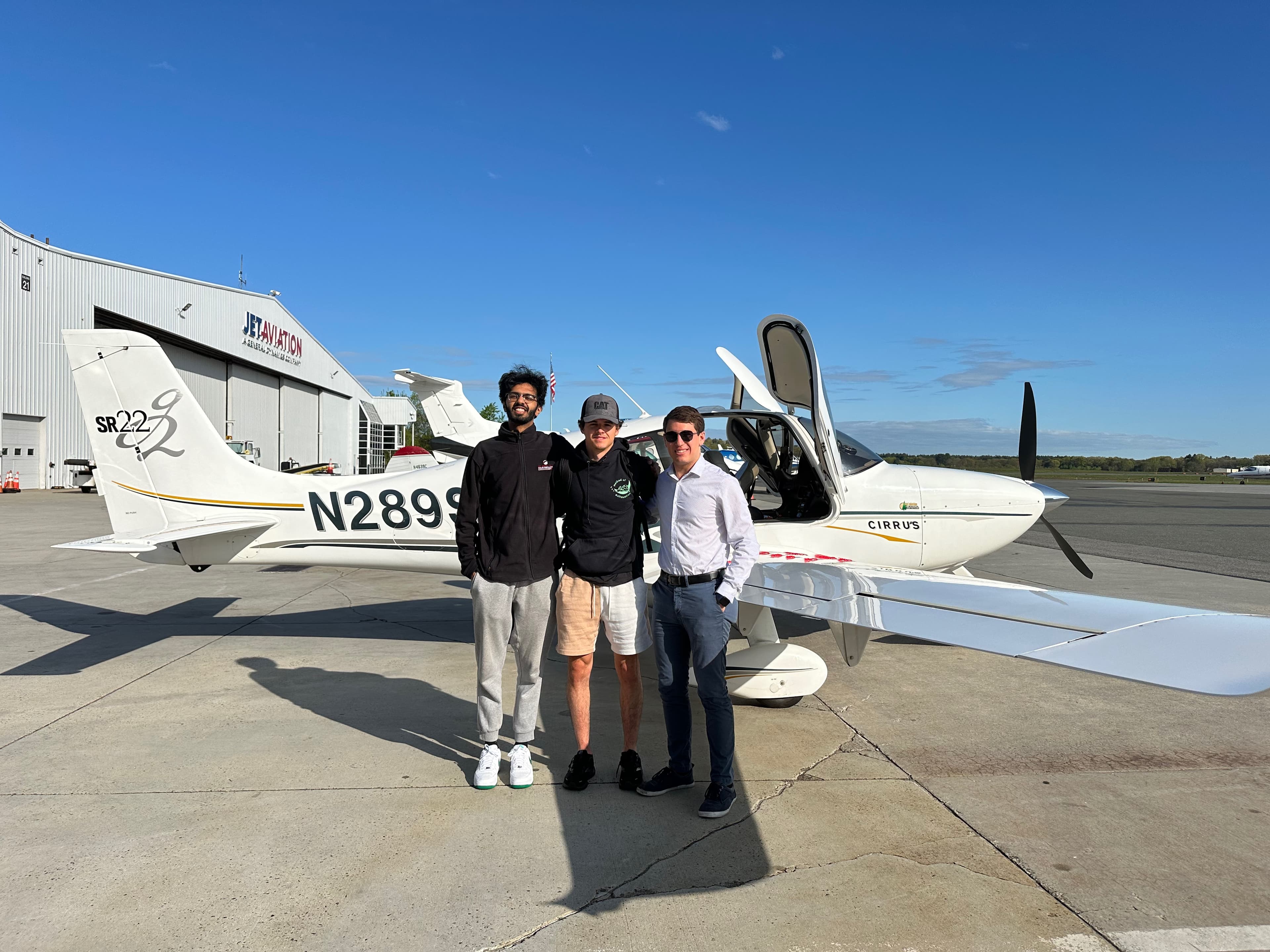 Pilot with clients at Cirrus SR22